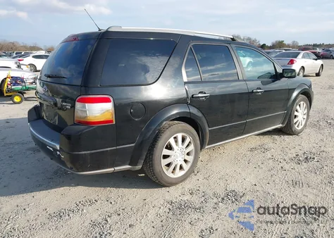 2008 Ford Taurus X Limited z USA, uszkodzony, nr VIN 1FMDK06W28GA06677